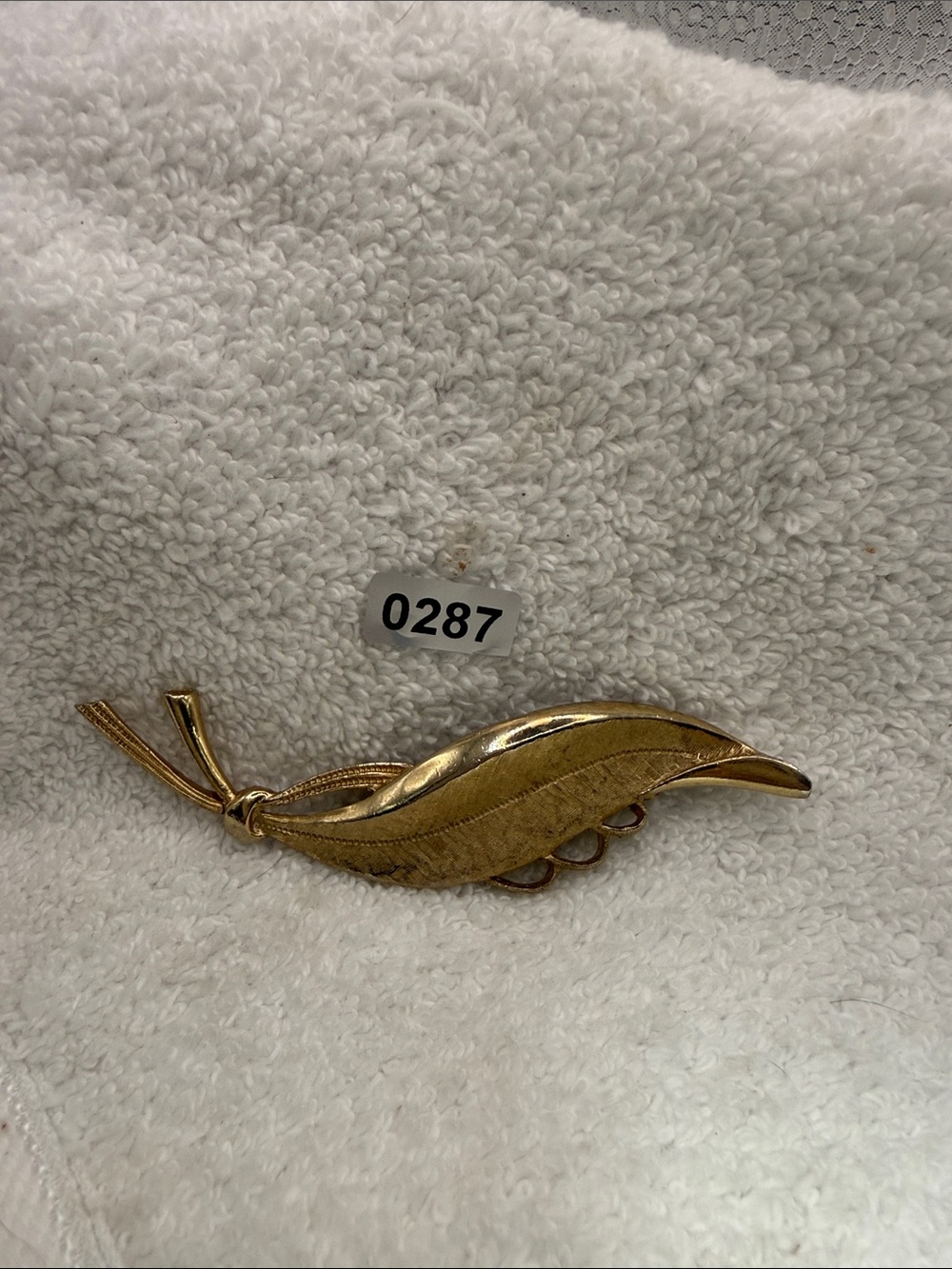 Gold-toned Leaf Brooch —
